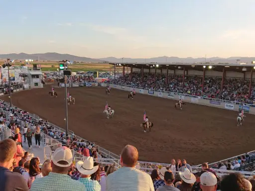A rodeo event shows Western spirit and excitement, highlighting how Rhino Rooter tackles sewer repair with toughness.