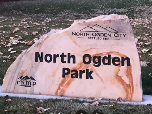 A welcoming sign for North Ogden Park and North Ogden City shows community pride—an area Rhino Rooter serves.