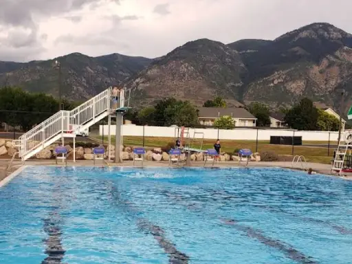A quiet public pool shows a calm place for families. Rhino Rooter helps with pipe work and repairs in areas like this.