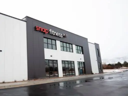 Building with a Snap Fitness sign, near Rhino Rooter’s expert sewer and trenchless pipe repair services in The Wasatch Front.
