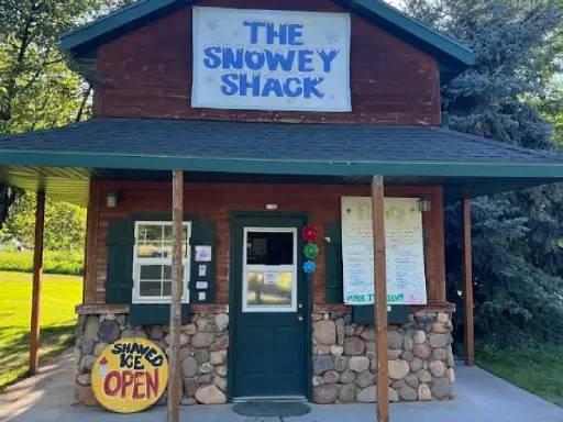 A small shop called The Snowey Shack offers shaved ice, making it a nice place to cool off after work with Rhino Rooter.