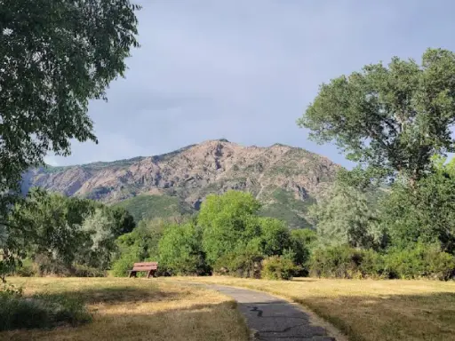 Rhino Rooter - Peaceful walkway with mountains, great place to relax after fixing sewers in The Wasatch Front.