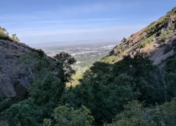 Looking out from a mountain, you can see a city below. This view shows the area that Rhino Rooter serves with expert sewer repair.