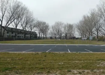 A quiet parking lot near apartments is ready for Rhino Rooter to provide trusted plumbing and drain cleaning.