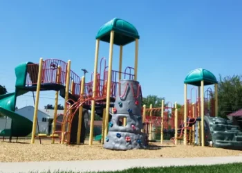 Rhino Rooter keeps the playground area neat and safe for kids, with clean grass and walkways nearby.