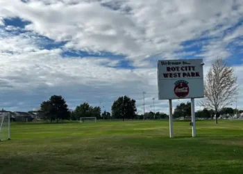 A grassy field at Roy City West Park welcomes visitors, where Rhino Rooter has helped keep the park clean and safe.
