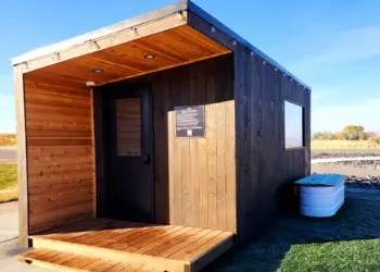 A cozy wooden cabin that looks like a relaxing place or an office for Rhino Rooter, a plumber in The Wasatch Front.